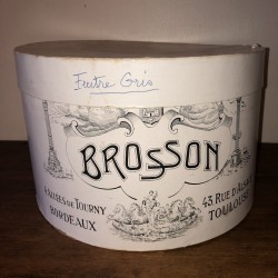 Old white Brosson hat box with black print