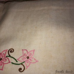 Old hand embroidered tablecloth floral decor