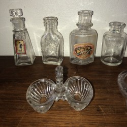 Old dinette and glass bottles | Collection | Old toy
