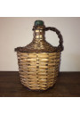 Old Dame Jeanne covered with wicker | Dame Jeanne vintage