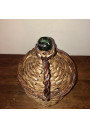 Old Dame Jeanne covered with wicker | Dame Jeanne vintage