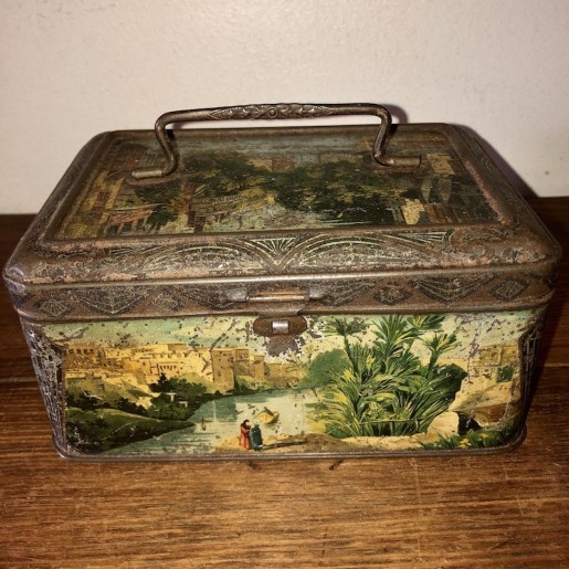 Old box of candies or cookies in lithographed tin