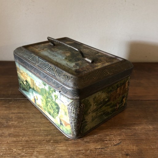 Old box of candies or cookies in lithographed tin