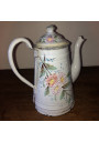 Ancienne cafetière en tôle émaillée blanche à décor floral en relièf