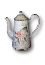 Ancienne cafetière en tôle émaillée blanche à décor floral en relièf
