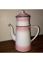 Old coffee maker in pink and white enamelled sheet metal