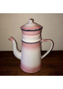 Old coffee maker in pink and white enamelled sheet metal