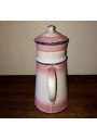 Old coffee maker in pink and white enamelled sheet metal
