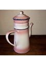 Old coffee maker in pink and white enamelled sheet metal