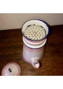 Old coffee maker in pink and white enamelled sheet metal