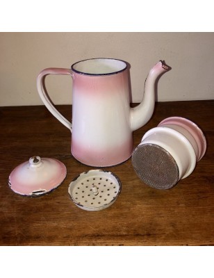 Old coffee maker in pink and white enamelled sheet metal