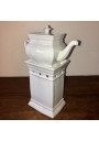 Old white porcelain teapot