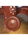 Old coffee maker in brown and white enamelled sheet metal