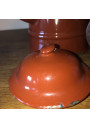 Old coffee maker in brown and white enamelled sheet metal