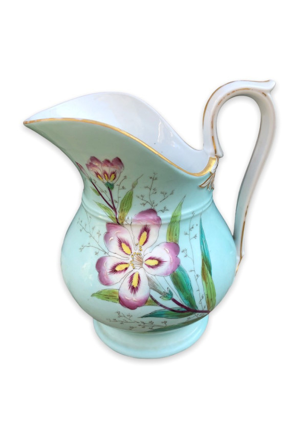 Old porcelain toilet pitcher