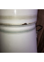 Very large and old coffee maker with enamelled sheet metal faucet