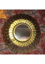Miroir soleil vintage en métal doré