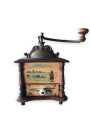 Old coffee grinder with 4 decorated faces