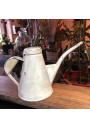 Old small sheet metal watering can with lid
