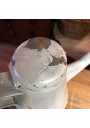 Old small sheet metal watering can with lid