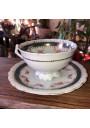 Ancienne tasse et soutasse en porcelaine