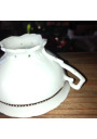 Ancienne tasse et soutasse en porcelaine