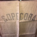 Anciens sacs en toile de jute | SOPECOBA 
- Lettrage délavé