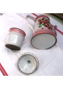 Old coffee maker in pink and white enamelled sheet metal with floral decoration