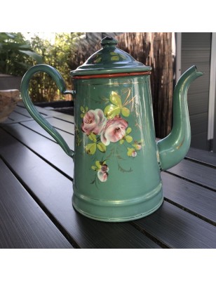 Old small coffee maker in green enamelled sheet metal with embossed floral decoration