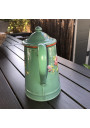 Old small coffee maker in green enamelled sheet metal with embossed floral decoration