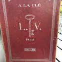 Old red box REPRISER LUSTRÉ A LA CLE L.V. PARIS