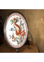 Old plate with Chinese and Japanese decor, solid silver strapping