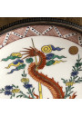 Old plate with Chinese and Japanese decor, solid silver strapping
