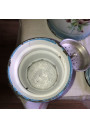 Old enameled sheet metal coffee maker decorated with pansies