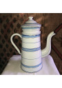 Old coffee maker in enameled sheet metal with blue and gold stripes