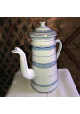 Old coffee maker in enameled sheet metal with blue and gold stripes
