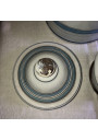 Old coffee maker in enameled sheet metal with blue and gold stripes