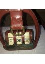 Old perpetual calendar with leather and brass stirrup