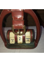 Old perpetual calendar with leather and brass stirrup