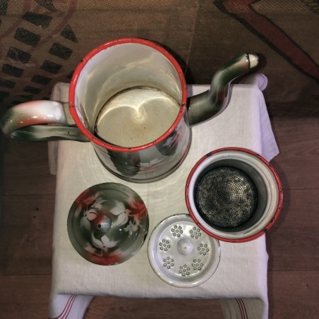 Old complete coffee maker in enameled sheet metal