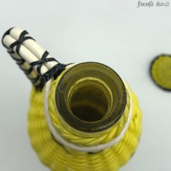 Vintage bottle in yellow and black scoubidou