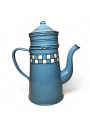 Old coffee maker in blue and white checkered enameled sheet metal