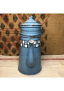 Old coffee maker in blue and white checkered enameled sheet metal
