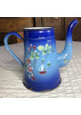 Old enameled sheet metal coffee pot with floral and boat decoration