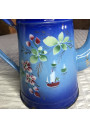 Old enameled sheet metal coffee pot with floral and boat decoration