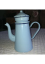 Old coffee pot in light blue enamelled sheet metal