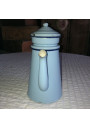 Old coffee pot in light blue enamelled sheet metal