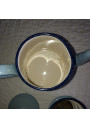Old coffee pot in light blue enamelled sheet metal