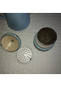 Old coffee pot in light blue enamelled sheet metal