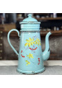 Old enameled metal coffee pot with bird and cherry decor